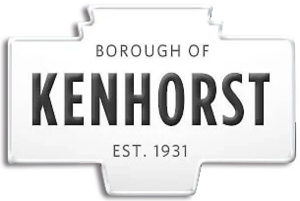 A white sign that says borough of kenhorst est . 1931 on it.