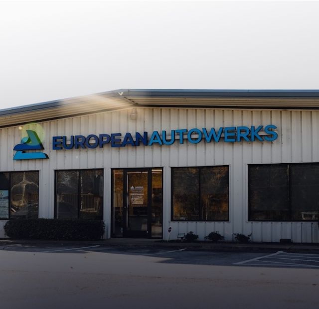 European AutoWerks storefront with blue signage on a beige commercial building | European Autowerks – Virginia Beach