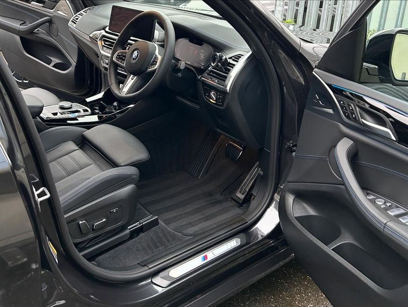 Premium SUV interior being steam cleaned during detail