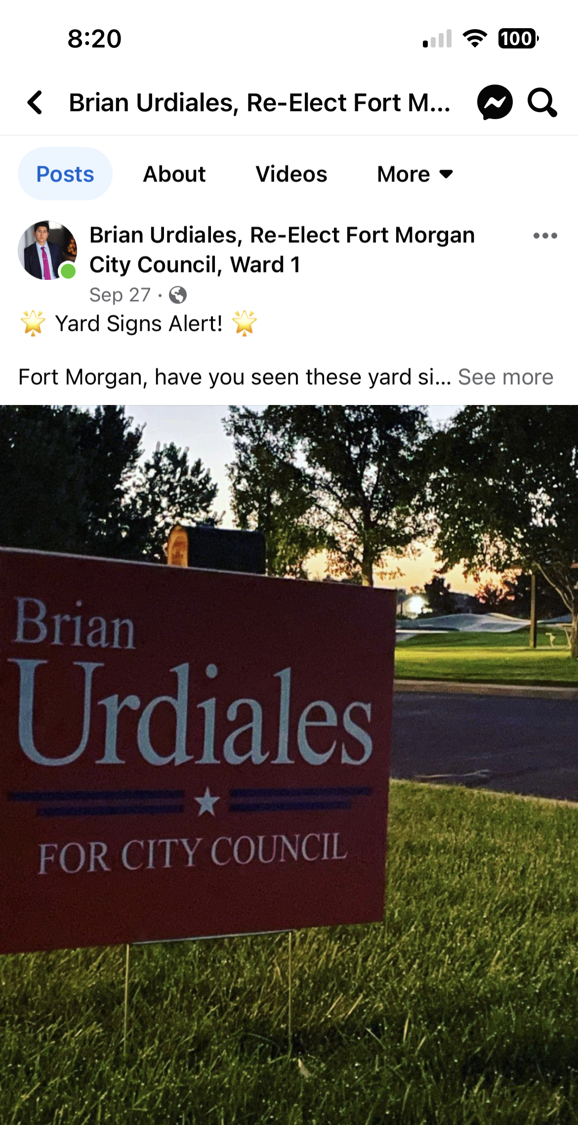 Brian Urdiales for city council campaign sign on a grassy lawn at dusk