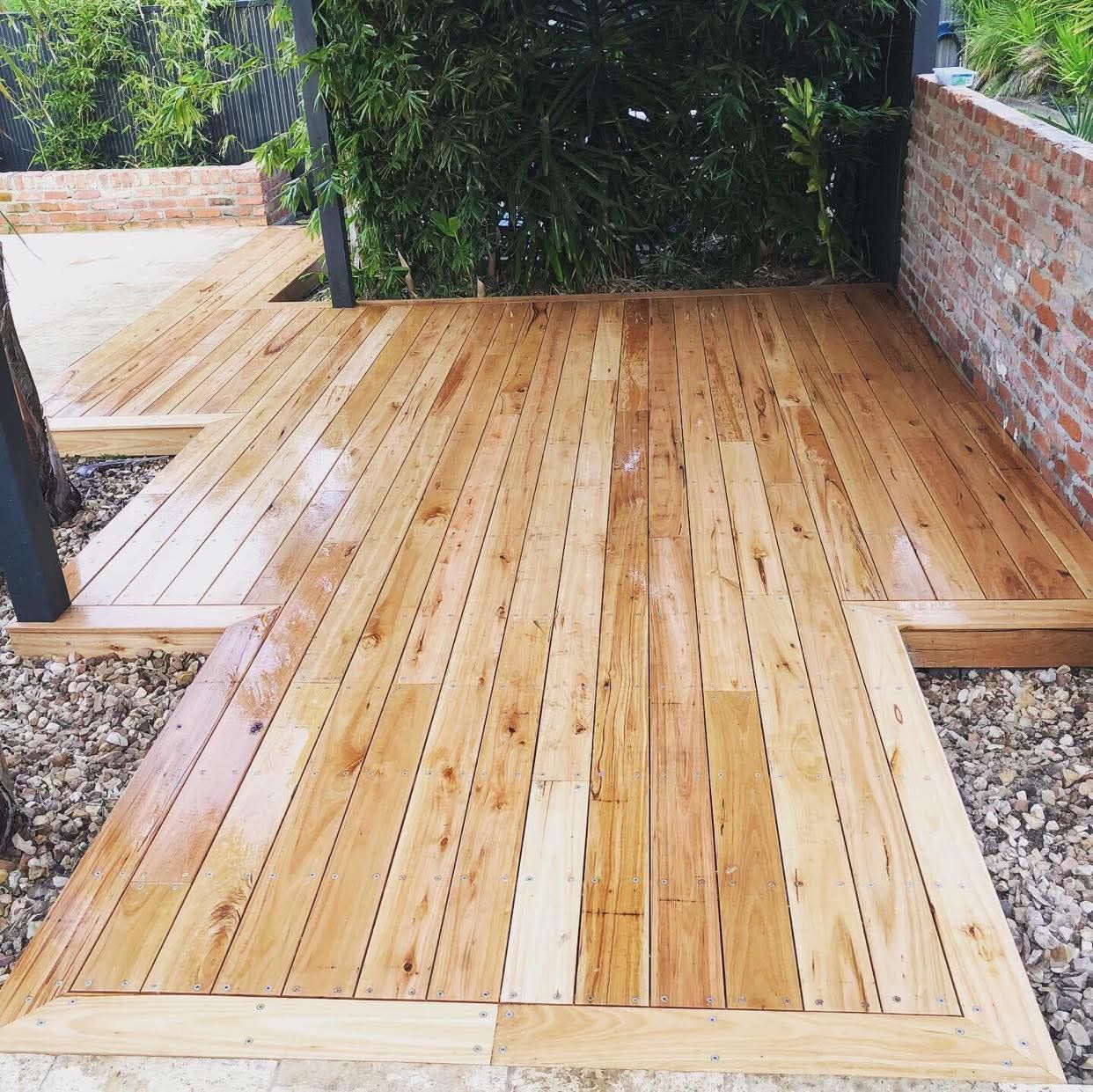 Wooden Deck Walkway With Light Tan Boards — RYDALL BUILDING AND DEVELOPMENT in Freshwater, QLD