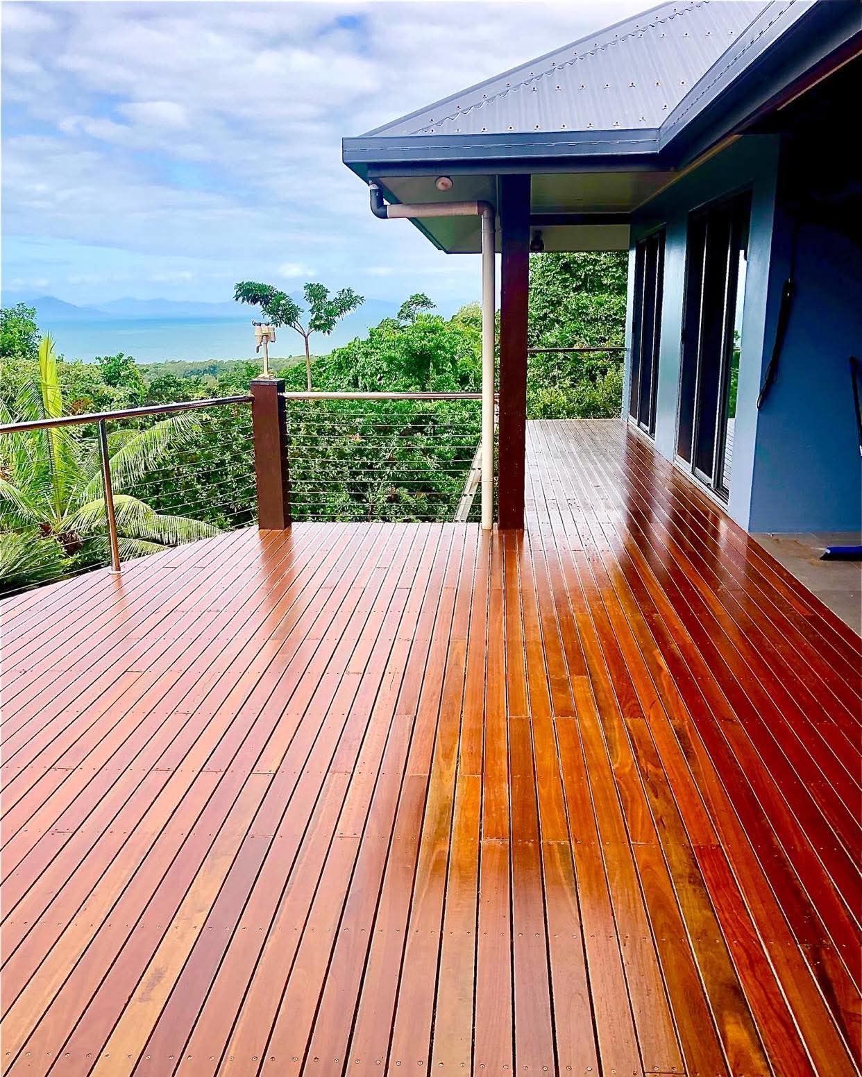 Wooden Deck With Glossy Floor and Railing — RYDALL BUILDING AND DEVELOPMENT in Freshwater, QLD