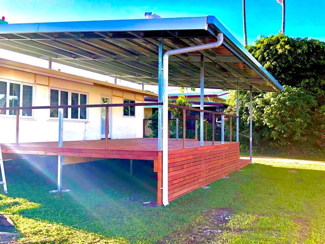 Covered Porch With Red Railing on a White House — RYDALL BUILDING AND DEVELOPMENT in Freshwater, QLD