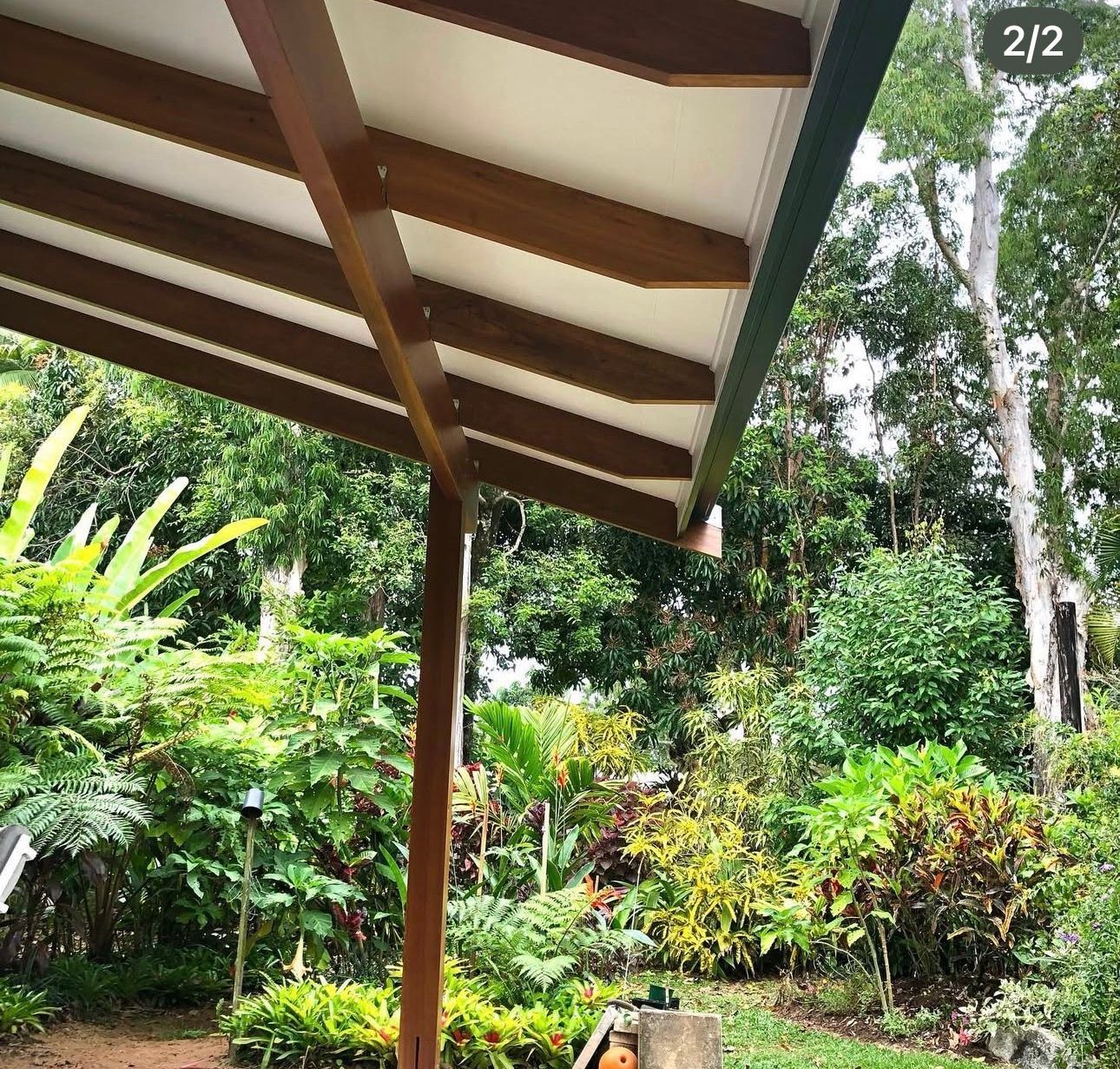 Covered Patio Overlooking Lush Tropical Garden — RYDALL BUILDING AND DEVELOPMENT in Freshwater, QLD