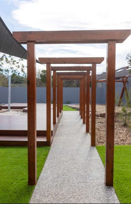 Wooden Pergola Walkway With Gravel Path — RYDALL BUILDING AND DEVELOPMENT in Freshwater, QLD