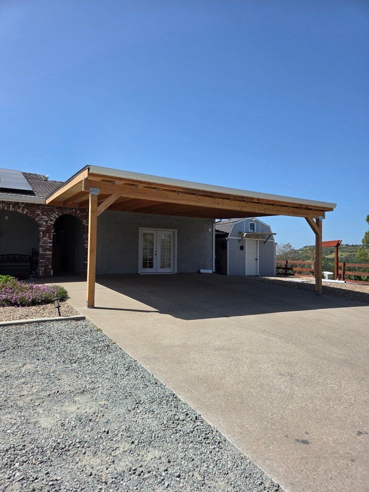 A house with a carport in front of it