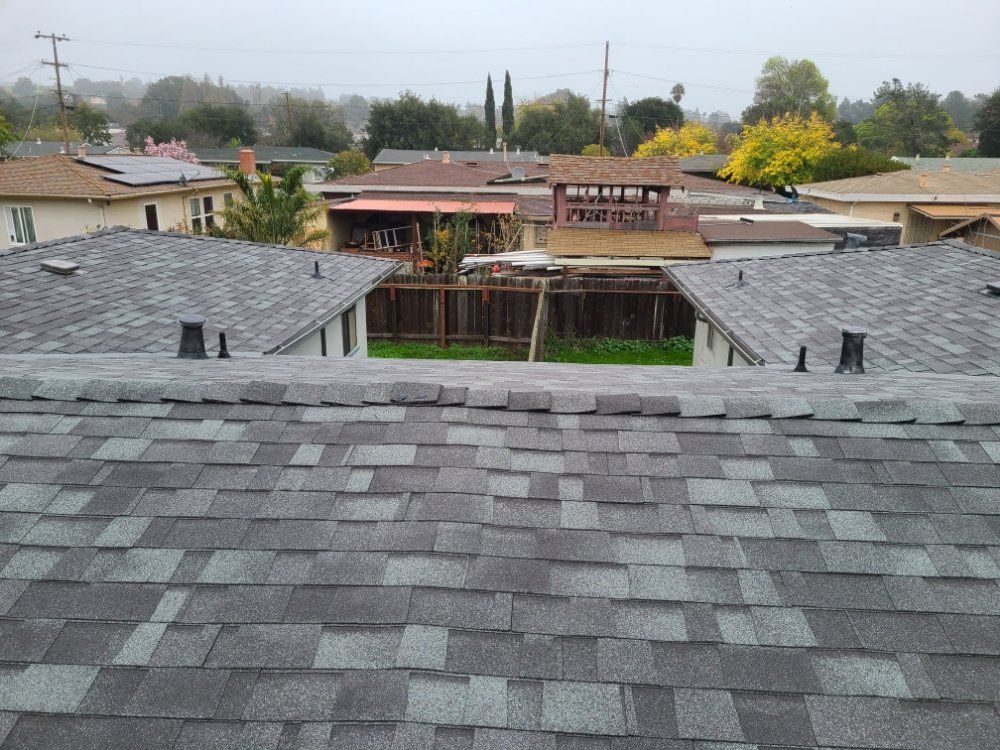 The roof of a house with a lot of shingles on it
