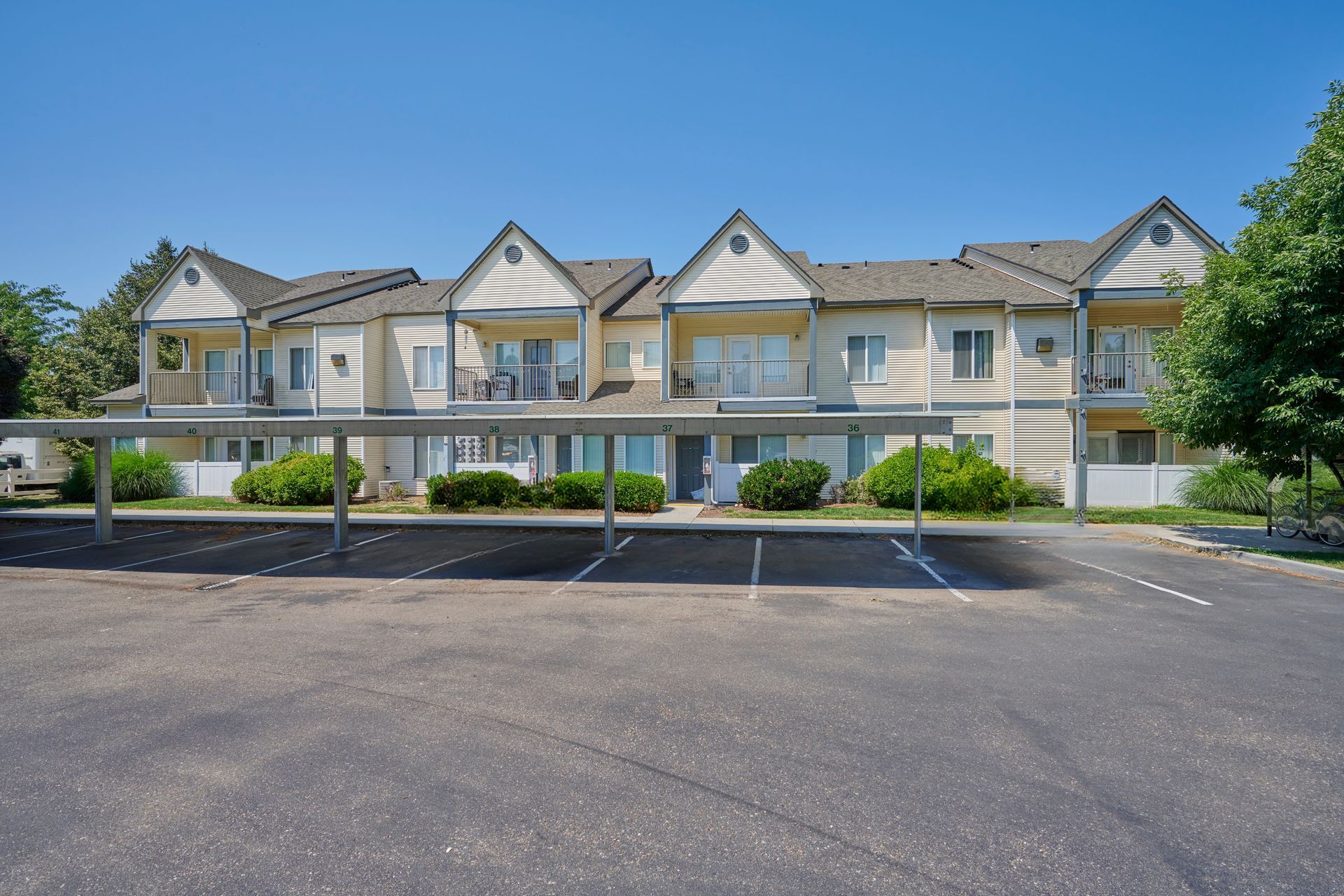 Apartment building with covered parking — boise apartments for rent