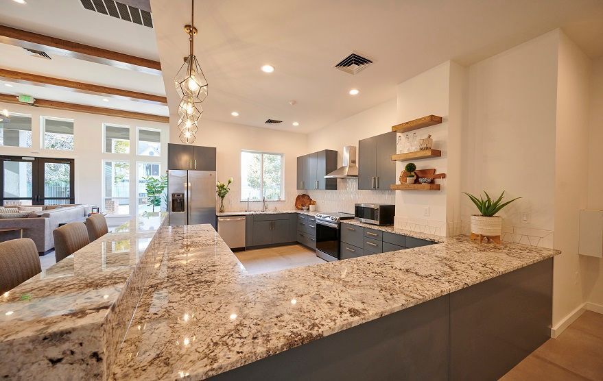 A modern kitchen with granite countertops — Apartments for Rent Boise