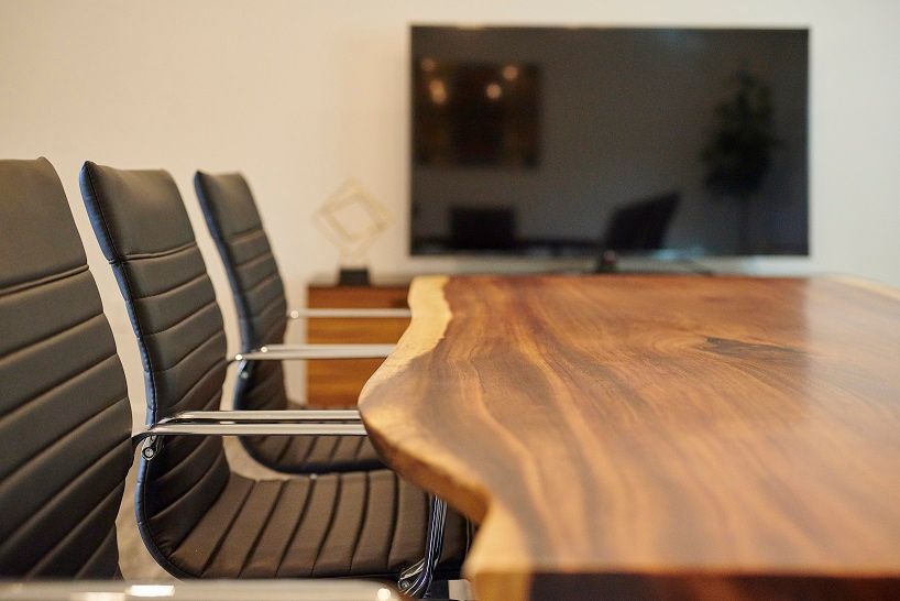 Conference room with wooden table — Apartments for Rent Boise