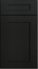 Black door with a small rectangular panel at the top and a larger recessed panel below.