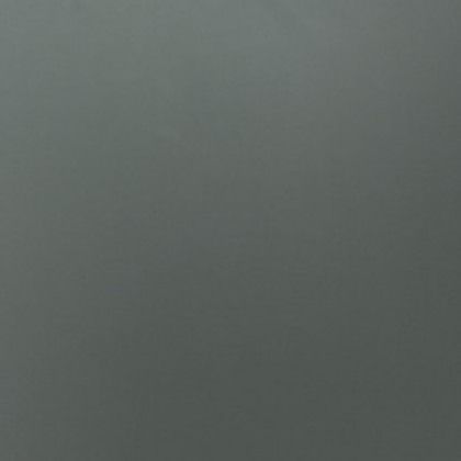 Blank gray surface with subtle texture and faint shadows.