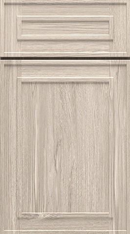 Light wood kitchen cabinet with raised panel door and drawer front