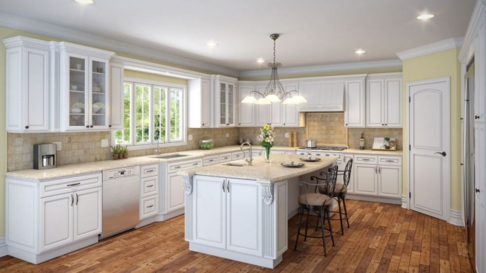 Bright white kitchen with center island, wood floors, beige countertops, and large windows