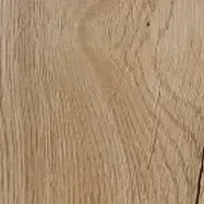 Close-up of light tan wood grain with a wavy natural pattern