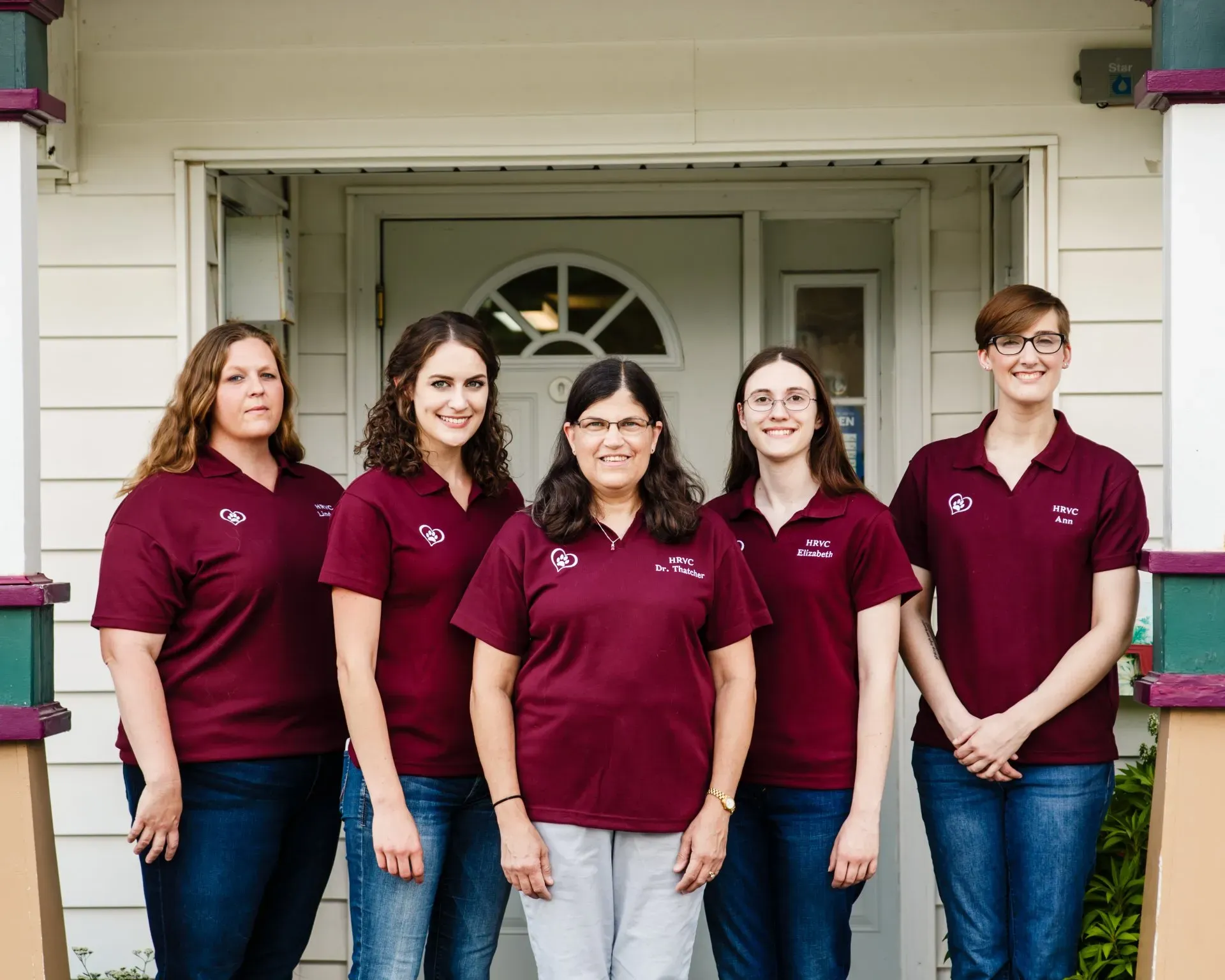 Women Wearing Red Shirt - Des Moines, IA - Hickman Road Veterinary Clinic Women Wearing Red Shirt - Des Moines, IA - Hickman Road Veterinary Clinic