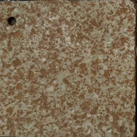 A close up of a blue and white granite counter top
