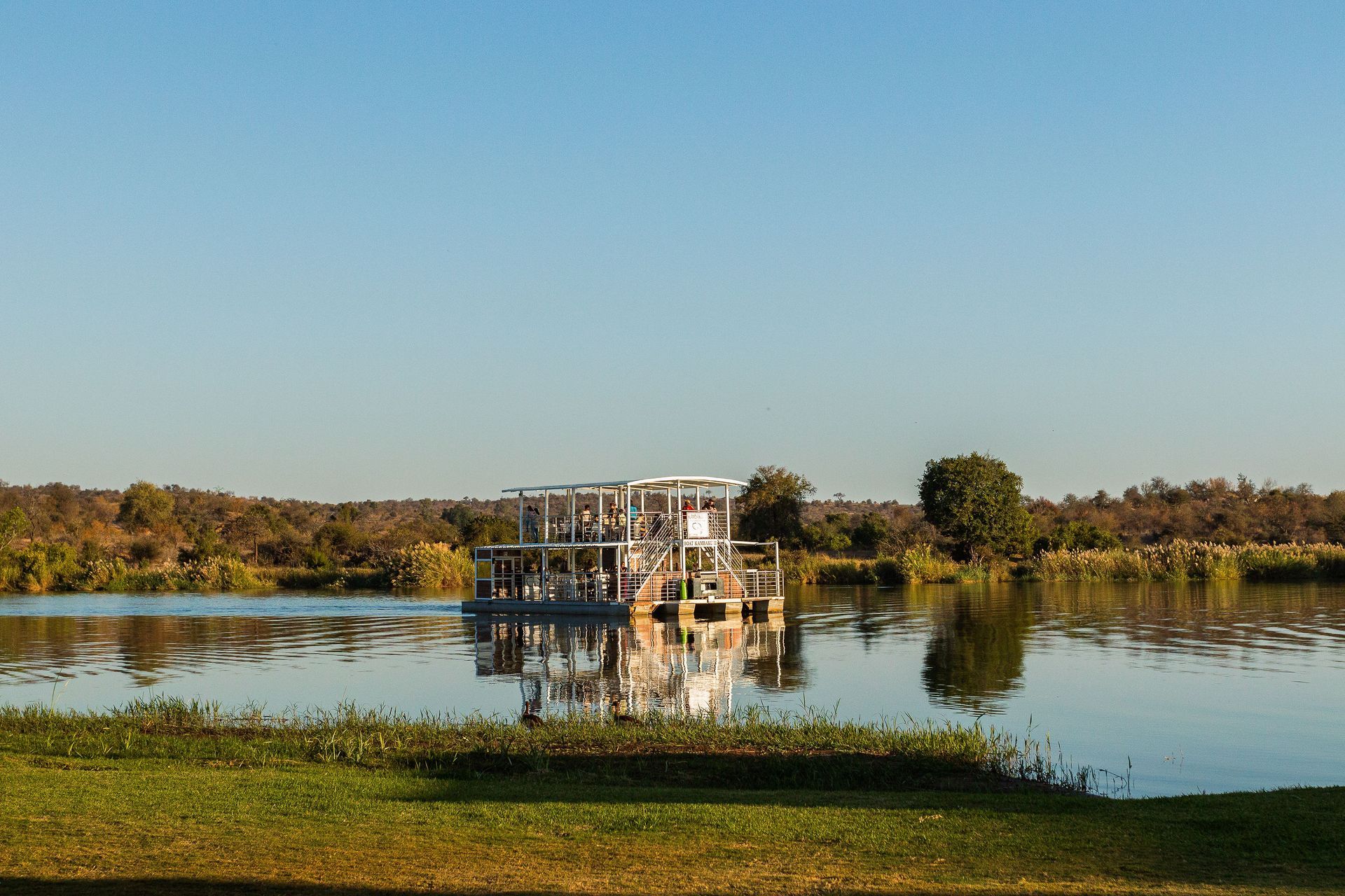 A guided boat cruise along the Olifants River offers a unique perspective of Greater Kruger’s wildlife and landscapes.
