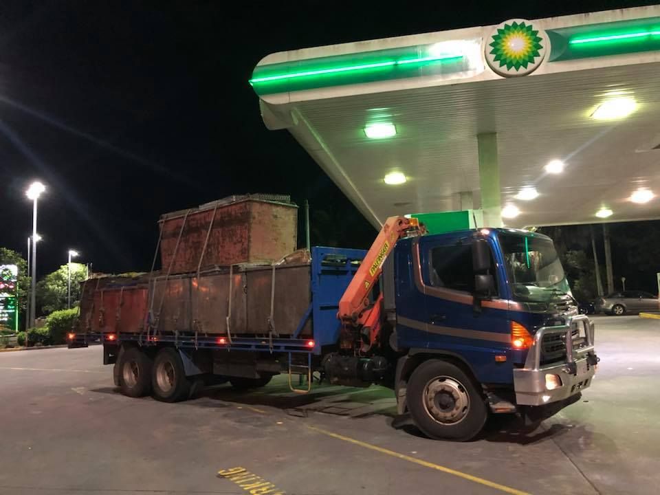 Blue Truck With Cargo At Bp Gas Station At Night — H&H Metal Recycling in Mudjimba, QLD