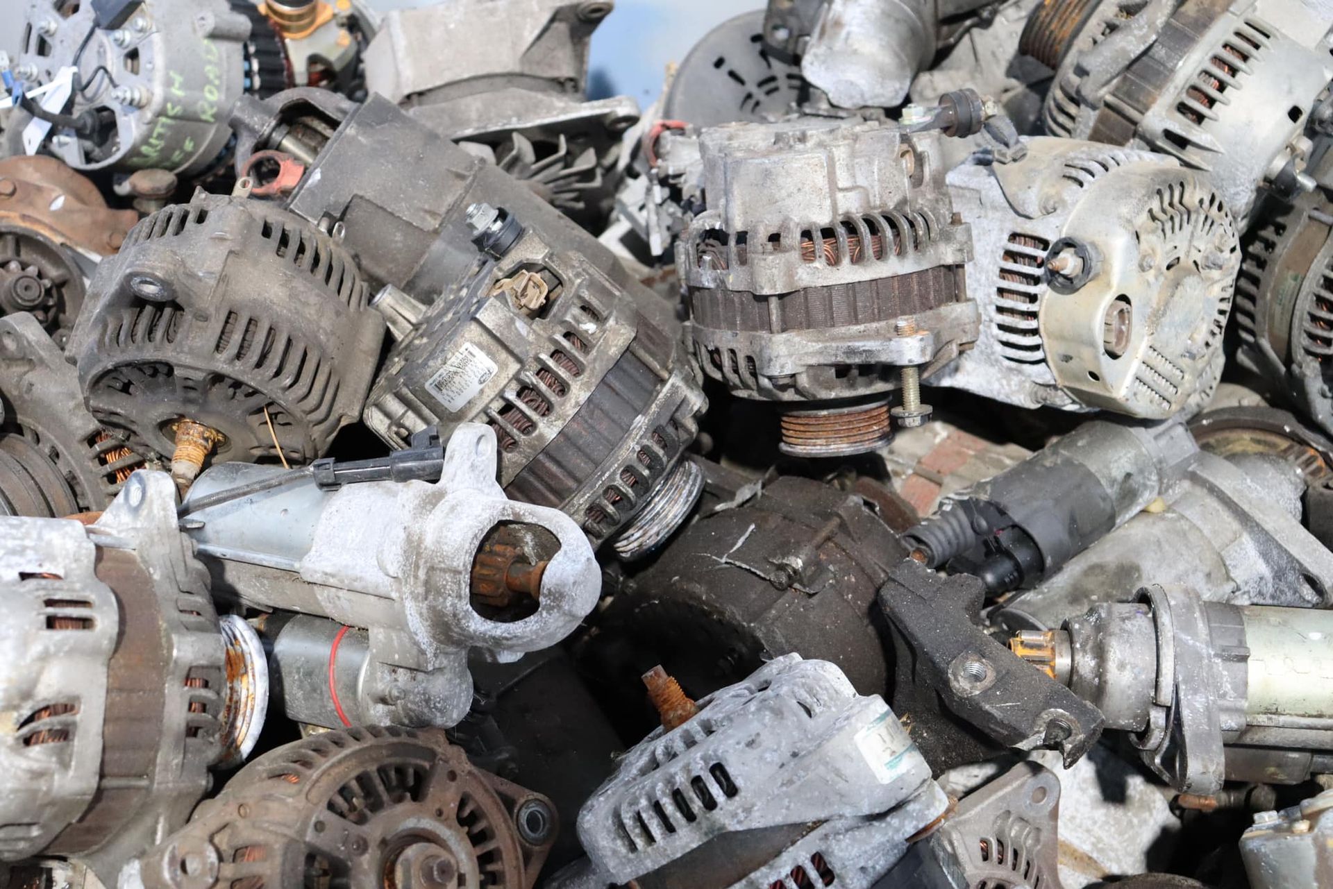 Various Electrical Motors And Equipment Loaded On A Flatbed Trailer — H&H Metal Recycling in Pelican Waters, QLD