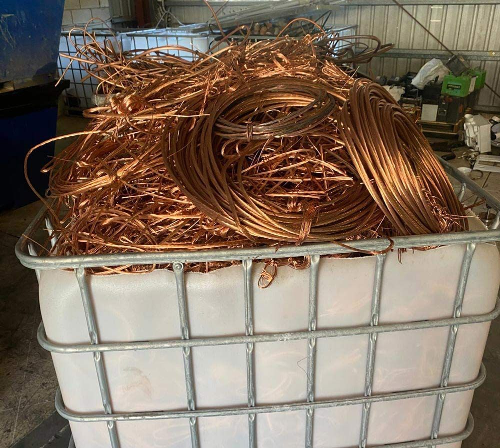 A White Bin Filled with A Pile of Copper Wire — H & H Metal Recycling In Kunda Park, QLD