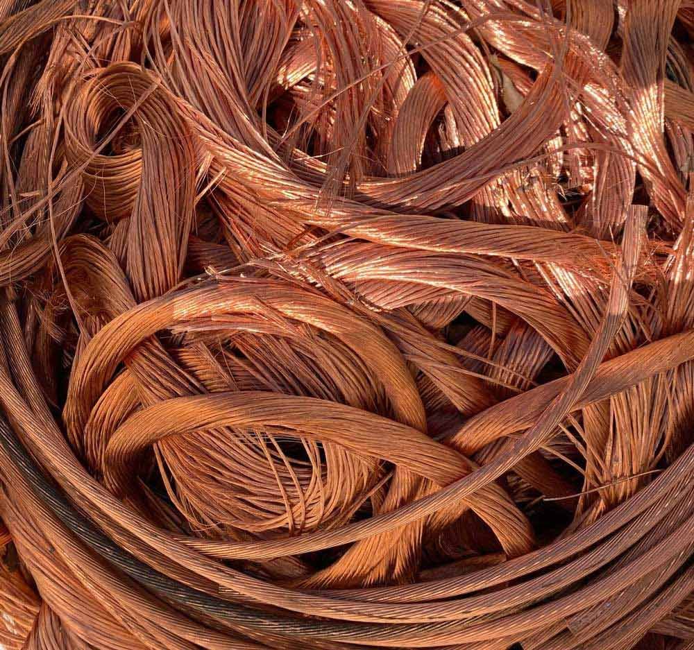 A Pile of Copper Wire Is Sitting on A Table — H & H Metal Recycling In Kunda Park, QLD