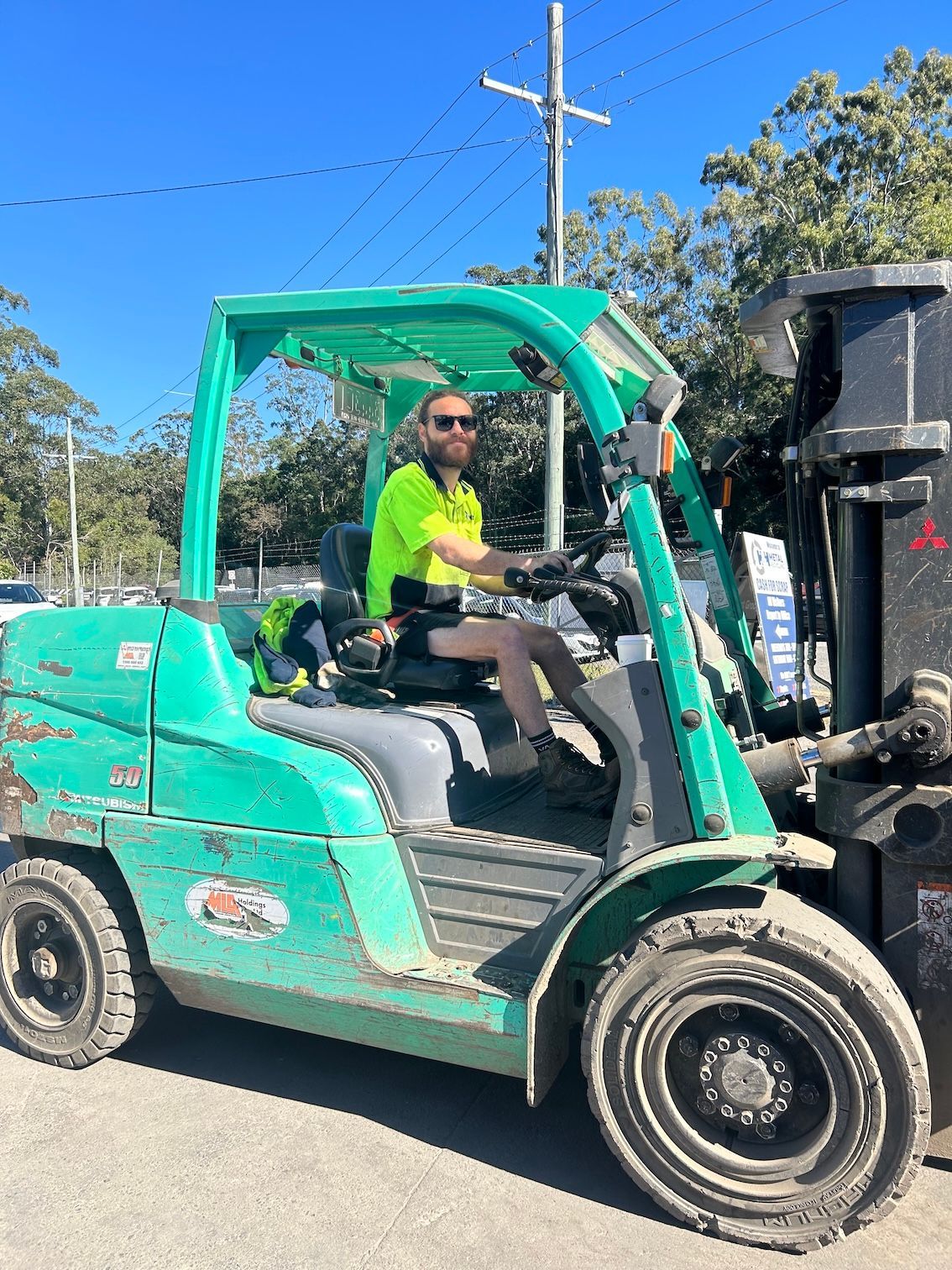 Man On Forklift — H & H Metal Recycling In Kunda Park, QLD