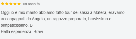 Screenshot di una recensione italiana a 5 stelle che elogia una guida turistica di Matera e definisce l'esperienza meravigliosa.