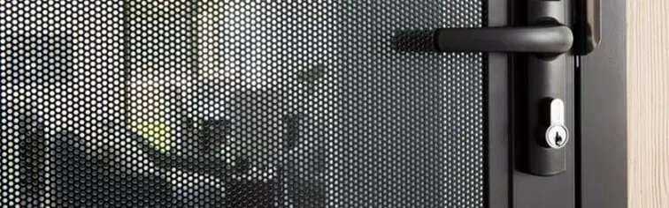 A Close Up Of A Screen Door With A Black Handle — Coastal Blind Installations In Agnes Waters, QLD