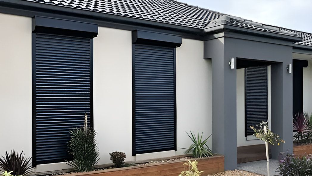A White House With Black Shutters On The Windows — Coastal Blind Installations In Kensington, QLD