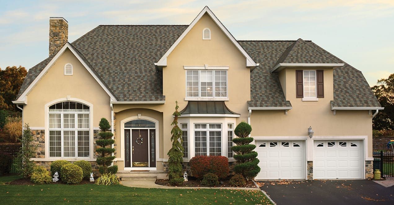 Modern House Roofing — Marengo, IL — Newman Roofing Company Modern House Roofing — Marengo, IL — Newman Roofing Company