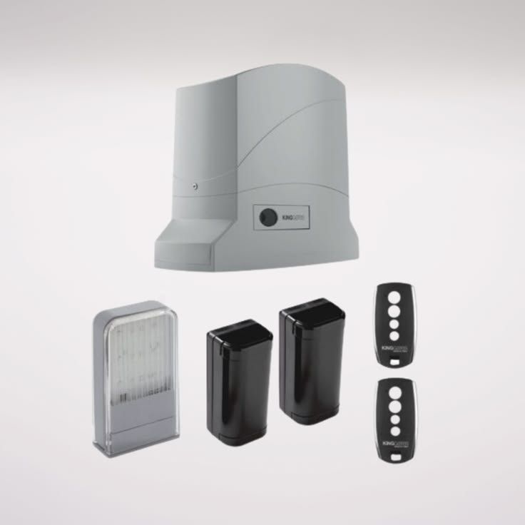 Kit motor para portão deslizante com acionador cinza, luz de advertência, par de fotocélulas de segurança e dois controles remotos.