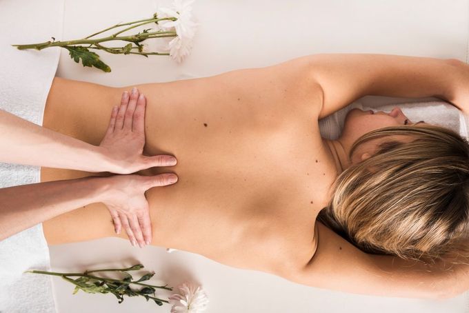 A Woman Is Getting A Massage At A Spa — Doubleview Health & Beauty In Elanora, QLD