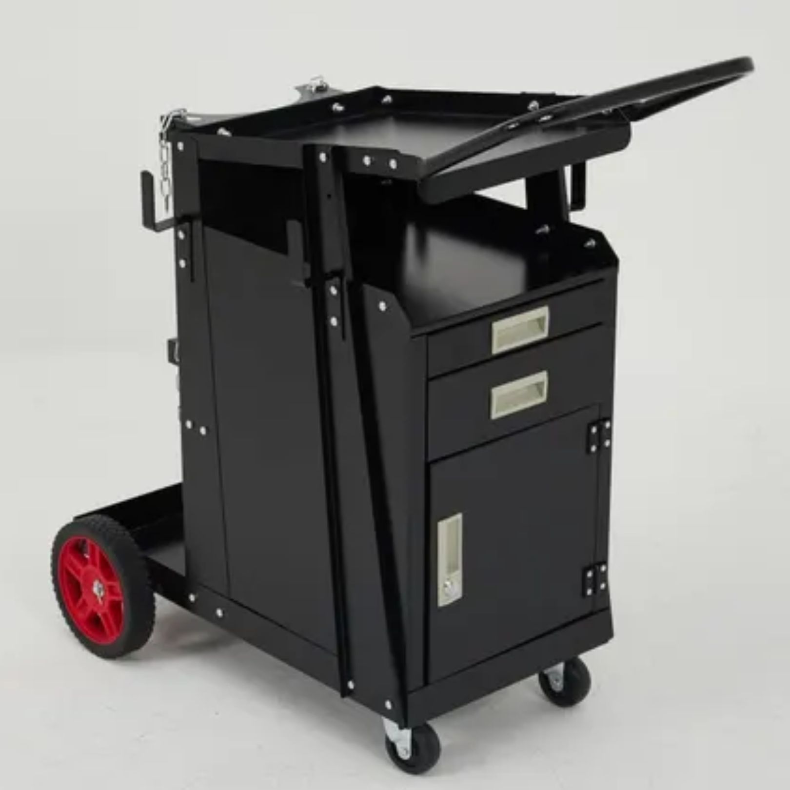 Black mobile utility cart with drawers, folding top tray, red wheel, and casters on a white background