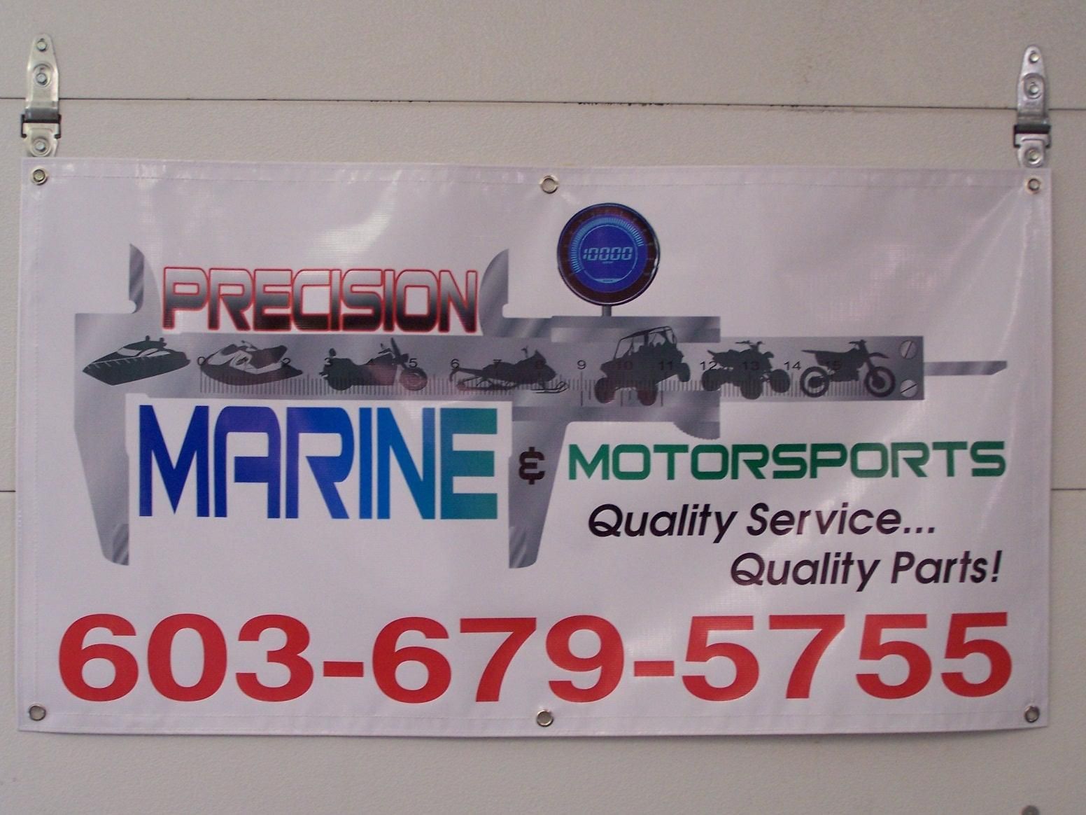 A sign for precision marine motorsports quality service quality parts
