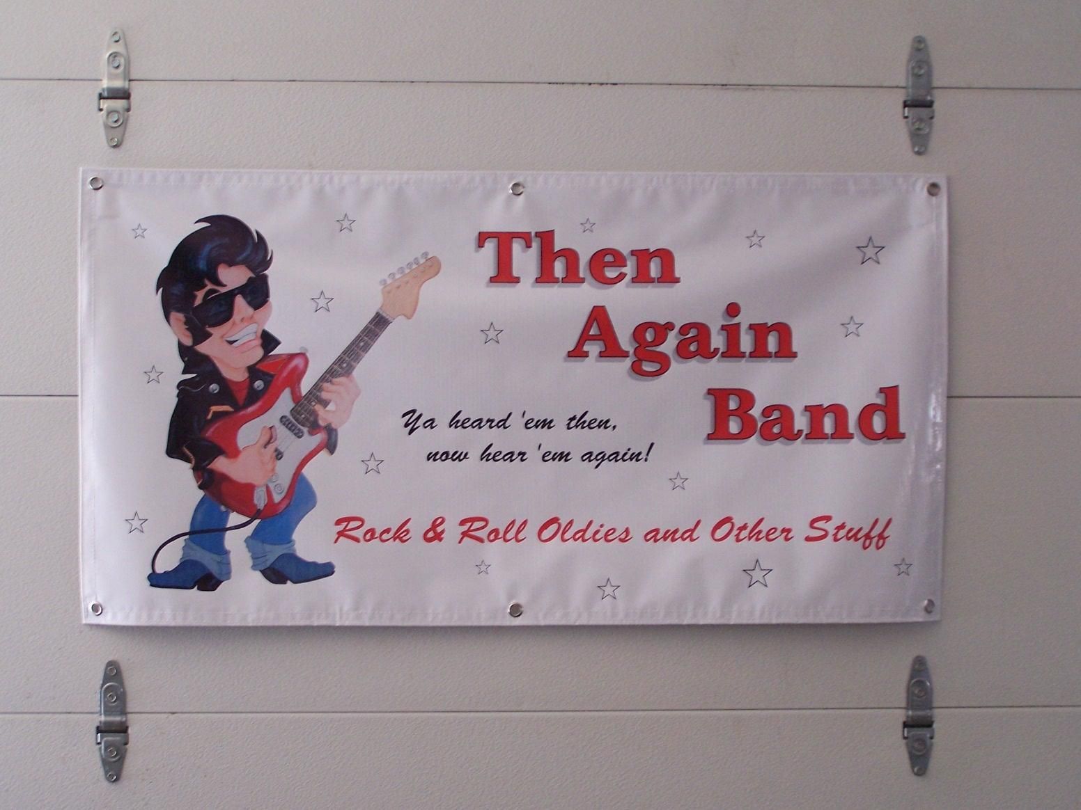 A banner that says then again band on it