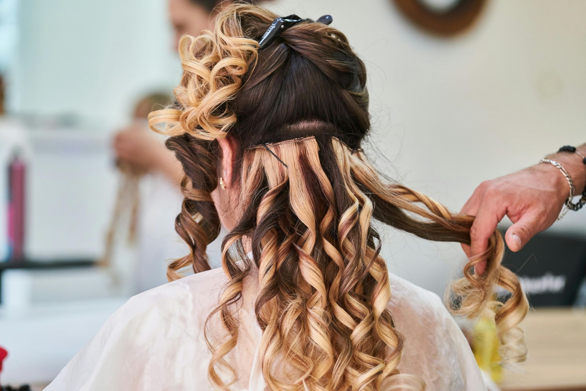 Lady With Long Curly Blonde Hair Wearing Makeup — Coolum Cutting Edge in Coolum Beach, QLD