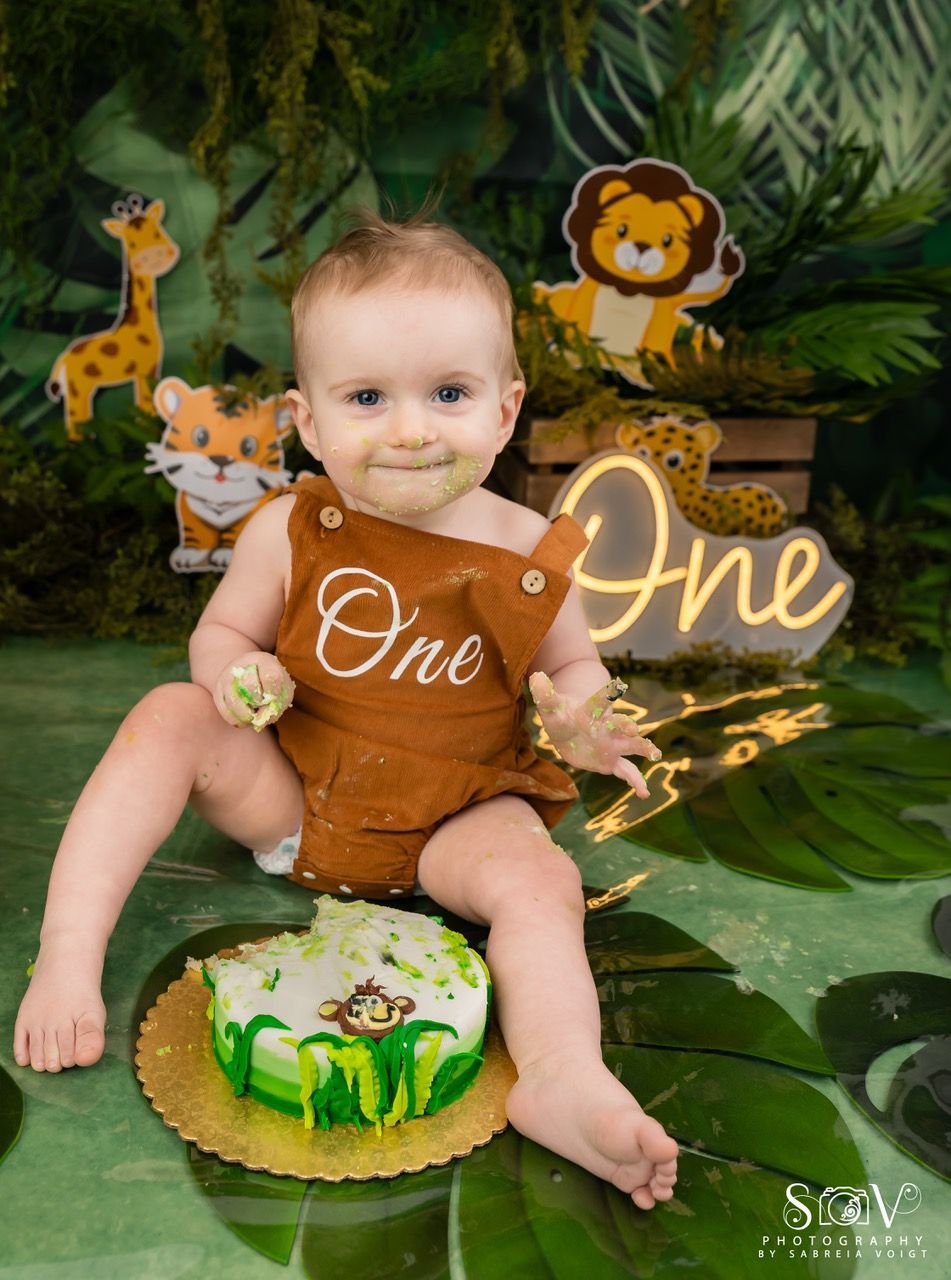 Baby in brown outfit with 