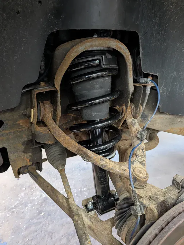 Suspension Spring And Rear Wheel Assembly | Treadlogic