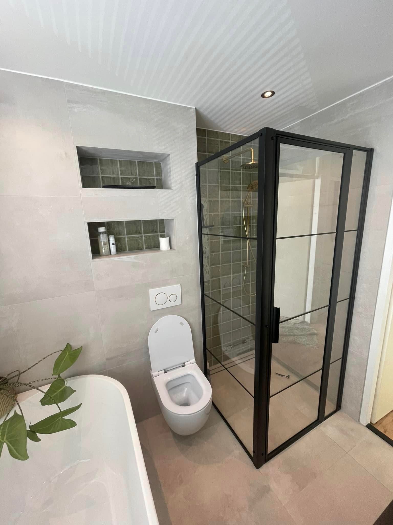afbeelding van een badkamer met een link naar badkamers pagina