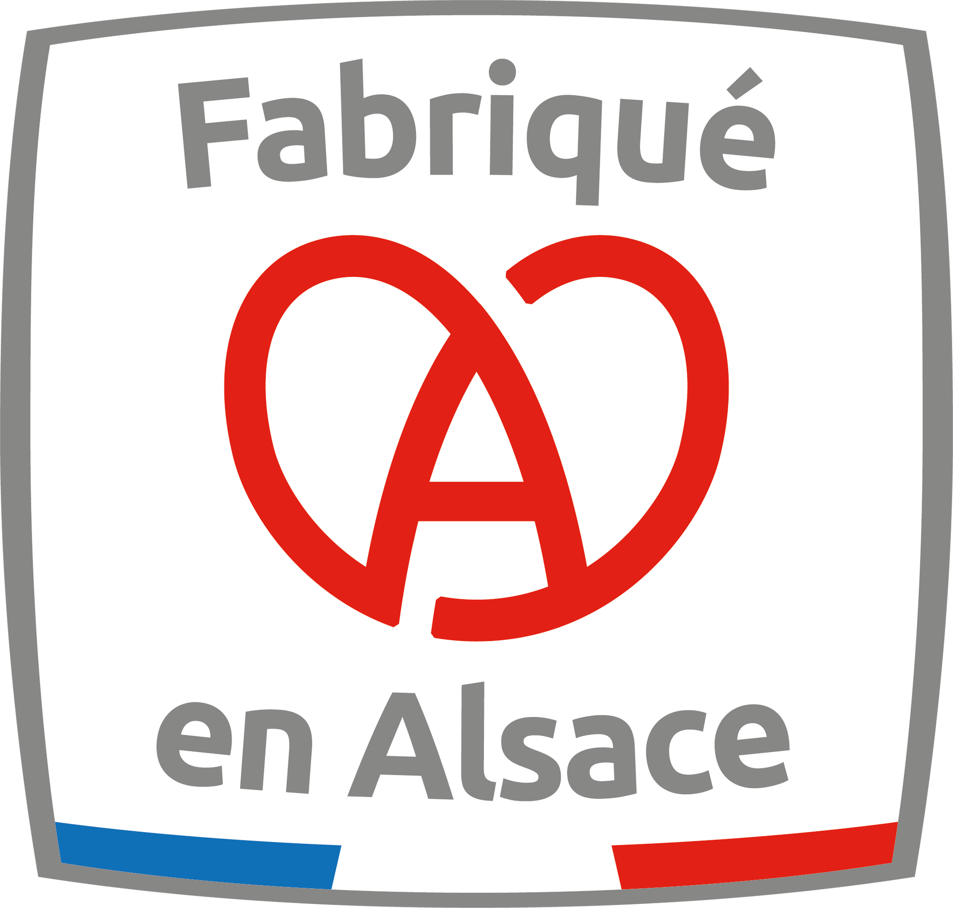 Un cœur rouge avec le mot fabrique en alsace dessus