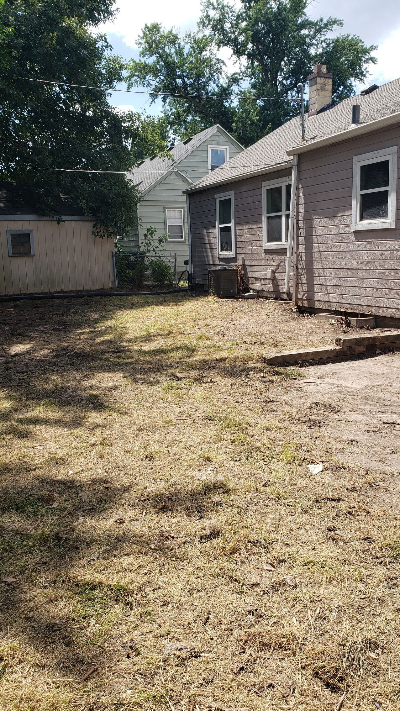 Cleared backyard after land clearing service