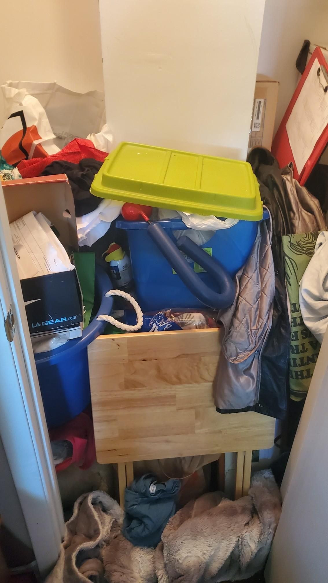 Closet before junk removal and cleanout
