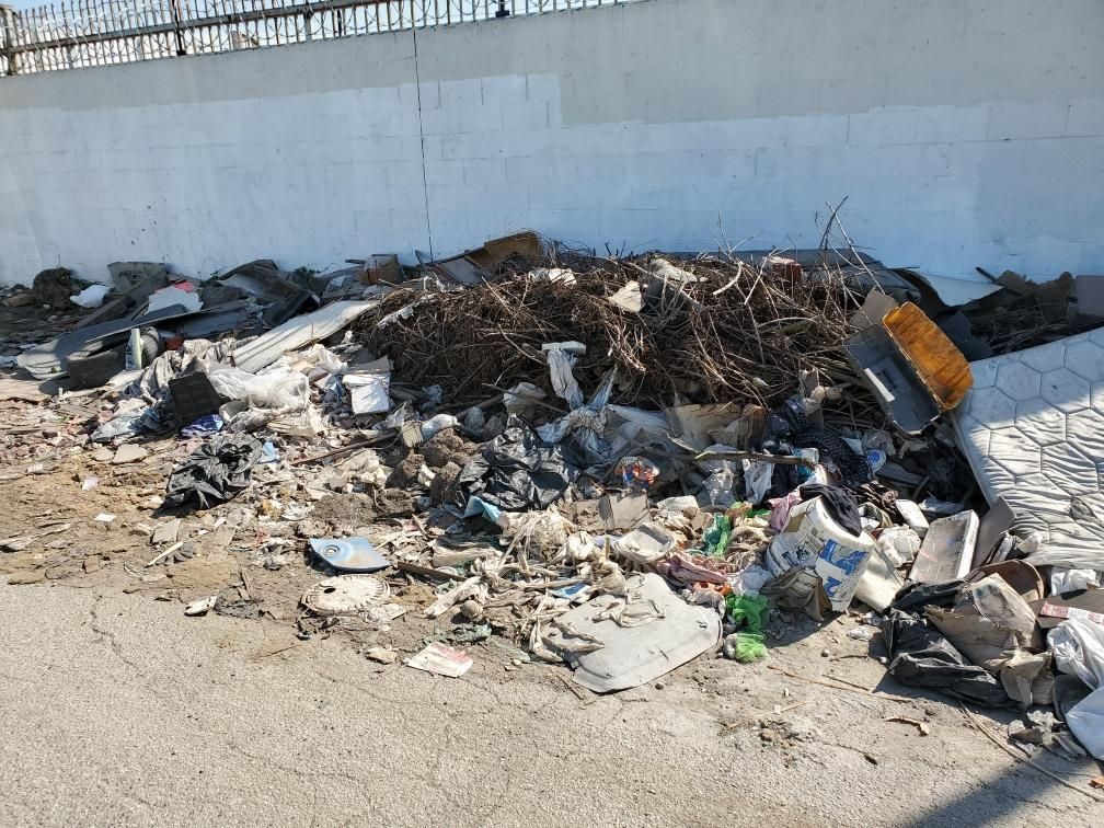 Commercial debris removal project before cleanup
