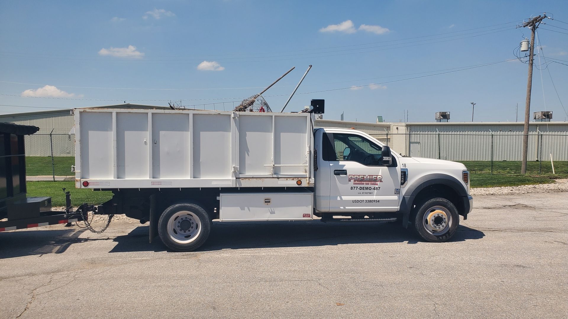 Premier Junk Hauling and Demolition work truck