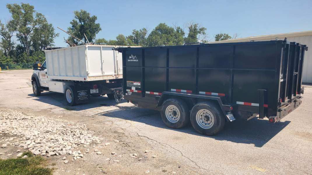 Premier Junk Hauling and Demolition F450 with trailer