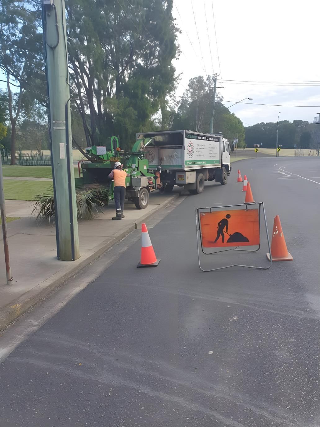 A Construction Truck is Parked on the Side of the Road — Steve Cubis Tree Services In Nimbin, NSW