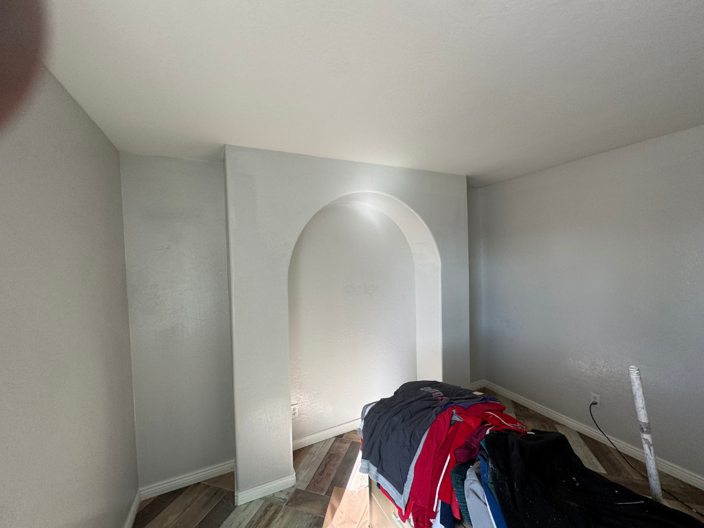 There is a bed in the middle of the room.