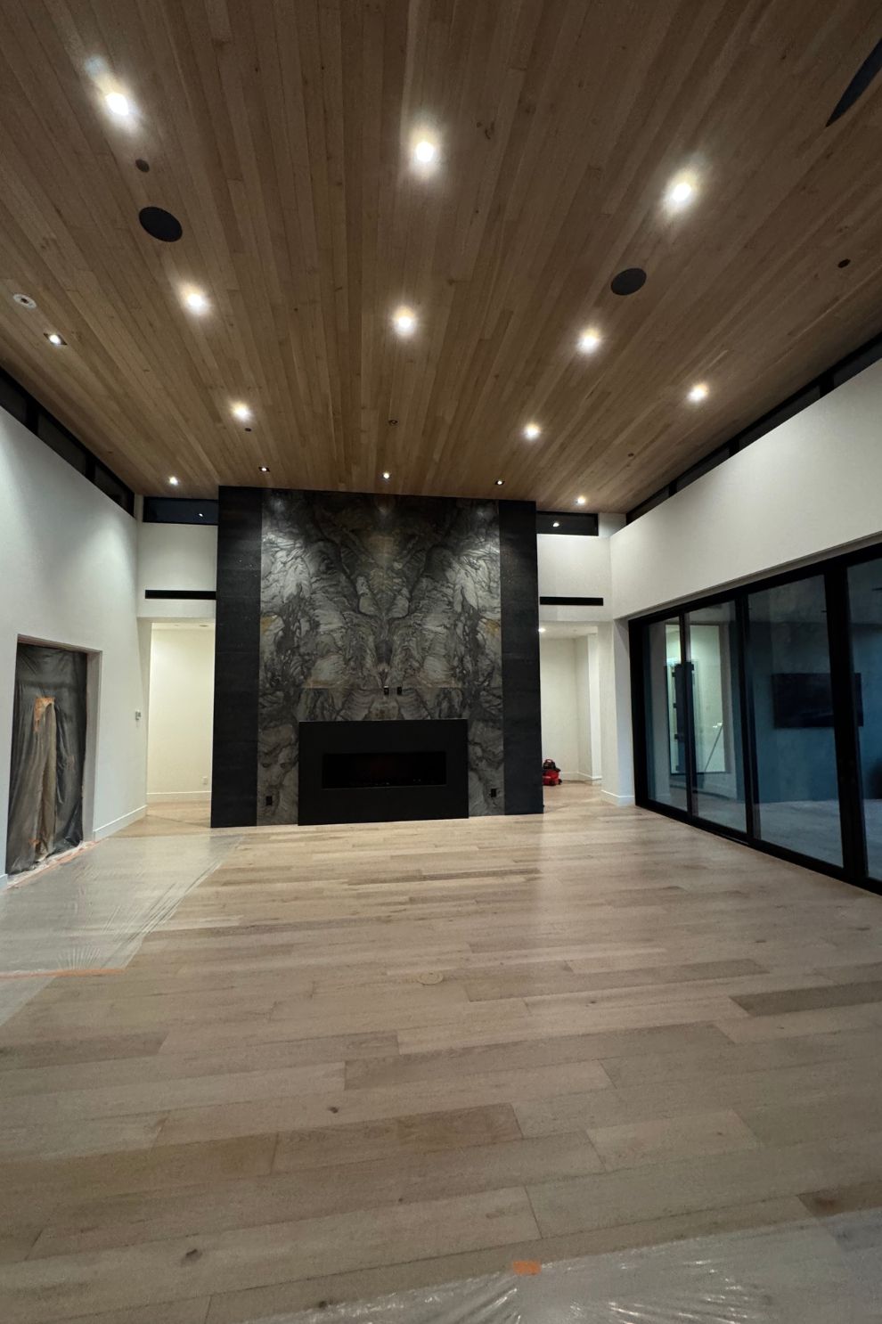 There is a fireplace in the middle of the room.
