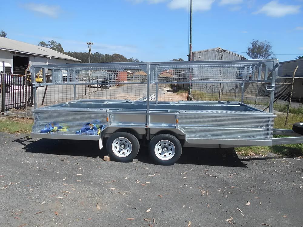 A metal trailer is parked on the side of the road Hastings Trailer Centre in Port Macquarie, NSW
